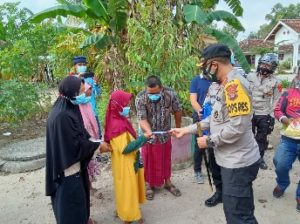 Polres Tubaba dan Komunitas Trail Ganas Bagikan Bansos Kepada Anak Yatim