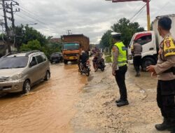 Hujan Lebat Sebabkan Jalinbar Pringsewu Tergenang Air
