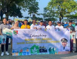 Pj. Bupati Tanggamus Launching Bank Bank Salingda dan Kegiatan Coastal Clean Up Dalam Rangka Hari Lingkungan Hidup Sedunia 