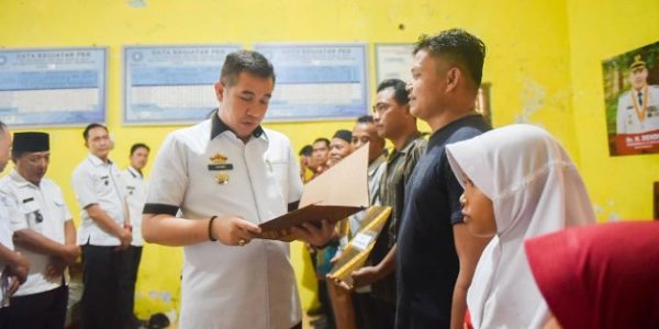 Sosialisasi dan Penyerahan Salinan SK Perhutanan Sosial Wujud Komitmen Pemkab Pesawaran Dukung Kesejahteraan KTH